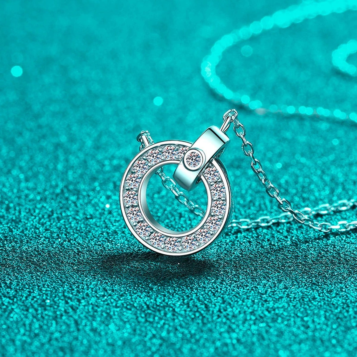 Circle Lock Moissanite Pendant Necklace in Rhodium-Plated S925 sterling silver blue display scene showing chain and stone layout