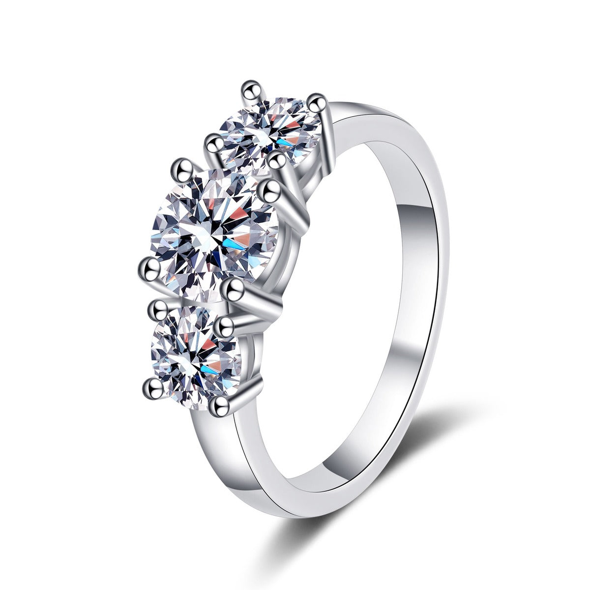 Three Stone Round Moissanite Ring in rhodium-plated S925 sterling silver on clean white background