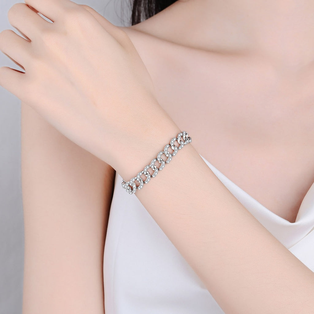 Cuban Chain Moissanite Bracelet in Rhodium-Plated S925 sterling silver worn on wrist model view showing scale and adjustable fit