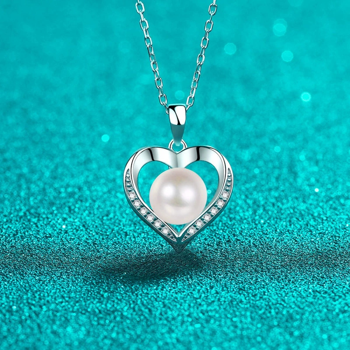 Heart Moissanite Pearl Pendant Necklace in Rhodium-Plated S925 sterling silver close-up product scene showing pendant setting