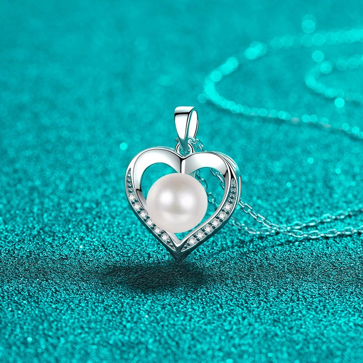 Heart Moissanite Pearl Pendant Necklace in Rhodium-Plated S925 sterling silver blue display scene showing chain and stone layout