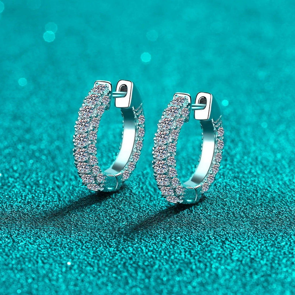 Wide Pave Moissanite Hoop Earrings in Rhodium-Plated S925 sterling silver product scene view showing front sparkle