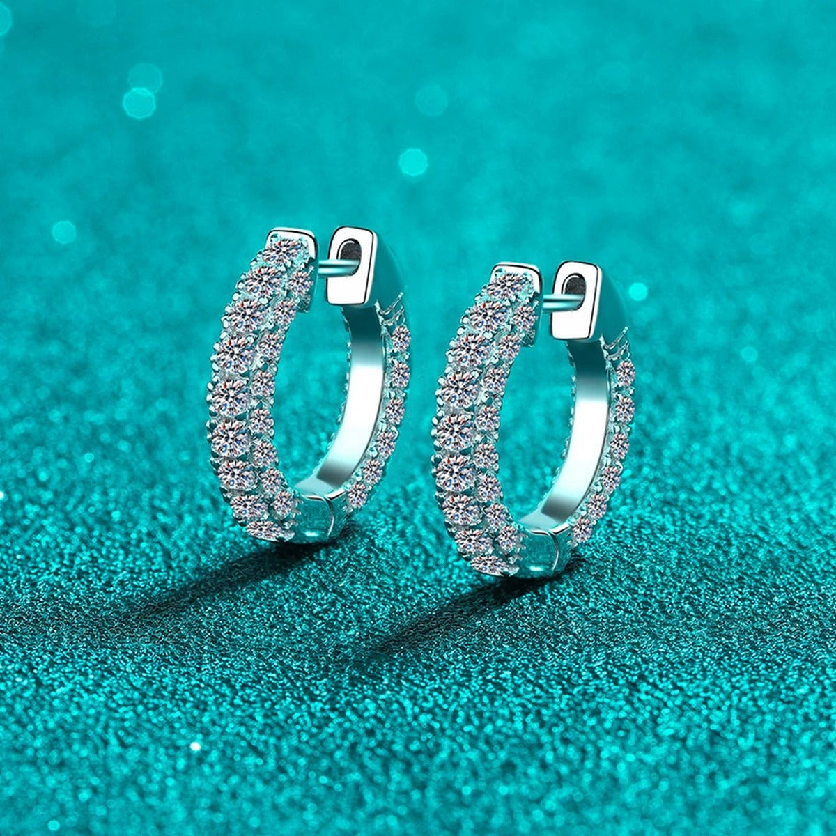 Wide Pave Moissanite Hoop Earrings in Rhodium-Plated S925 sterling silver product scene view showing front sparkle