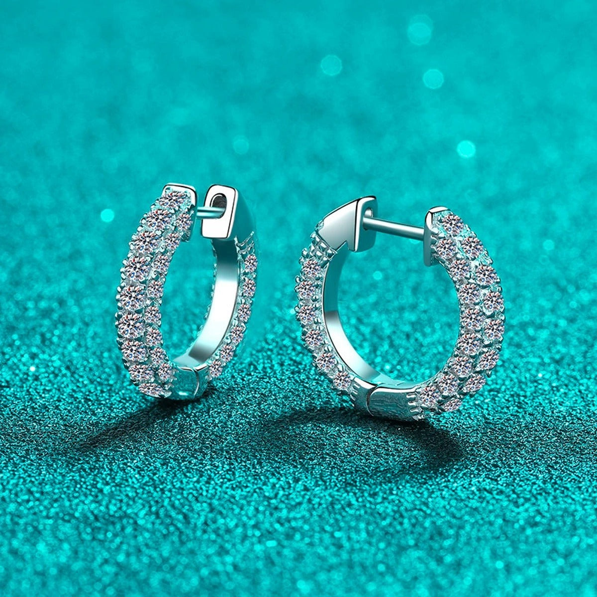 Wide Pave Moissanite Hoop Earrings in Rhodium-Plated S925 sterling silver product scene view showing angled setting detail