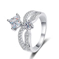 Radiant and Round Moissanite Ring with CZ in rhodium-plated S925 sterling silver on clean white background