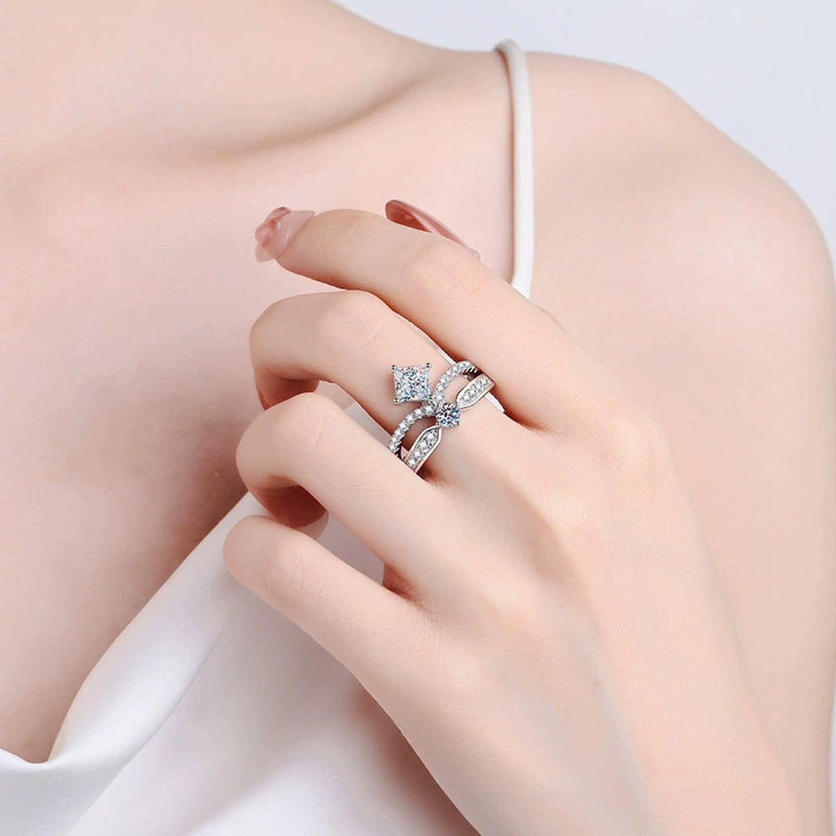 Radiant and Round Moissanite Ring with CZ worn on hand to show scale and ring profile