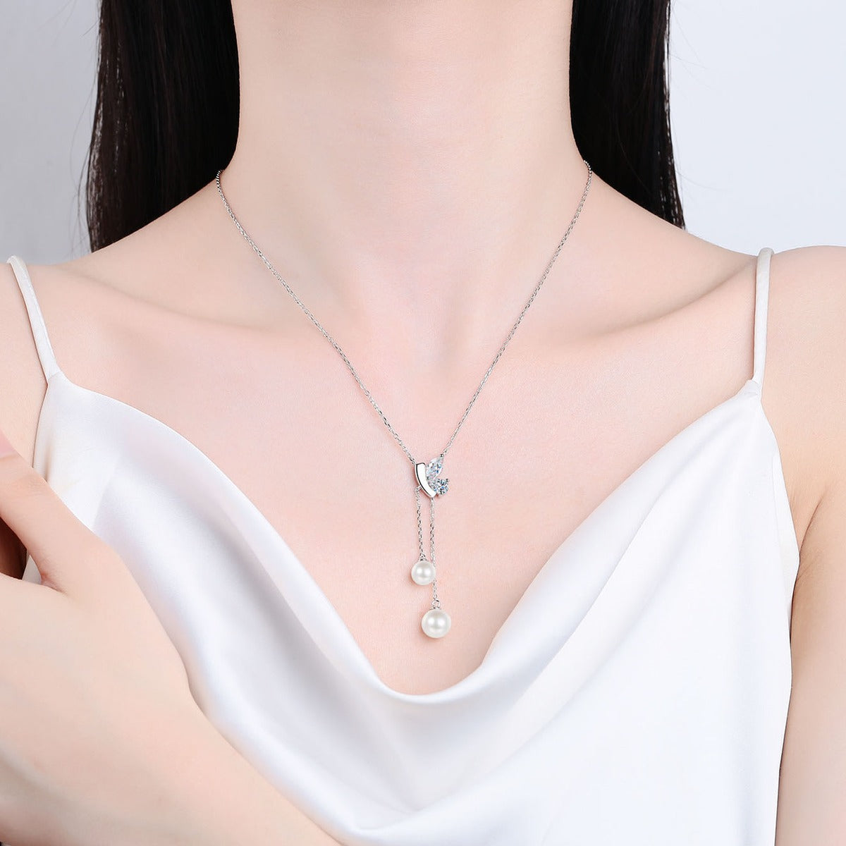 Mixed Cut Moissanite Pearl Lariat Necklace in Rhodium-Plated S925 sterling silver neckline model view showing pendant scale and adjustable chain