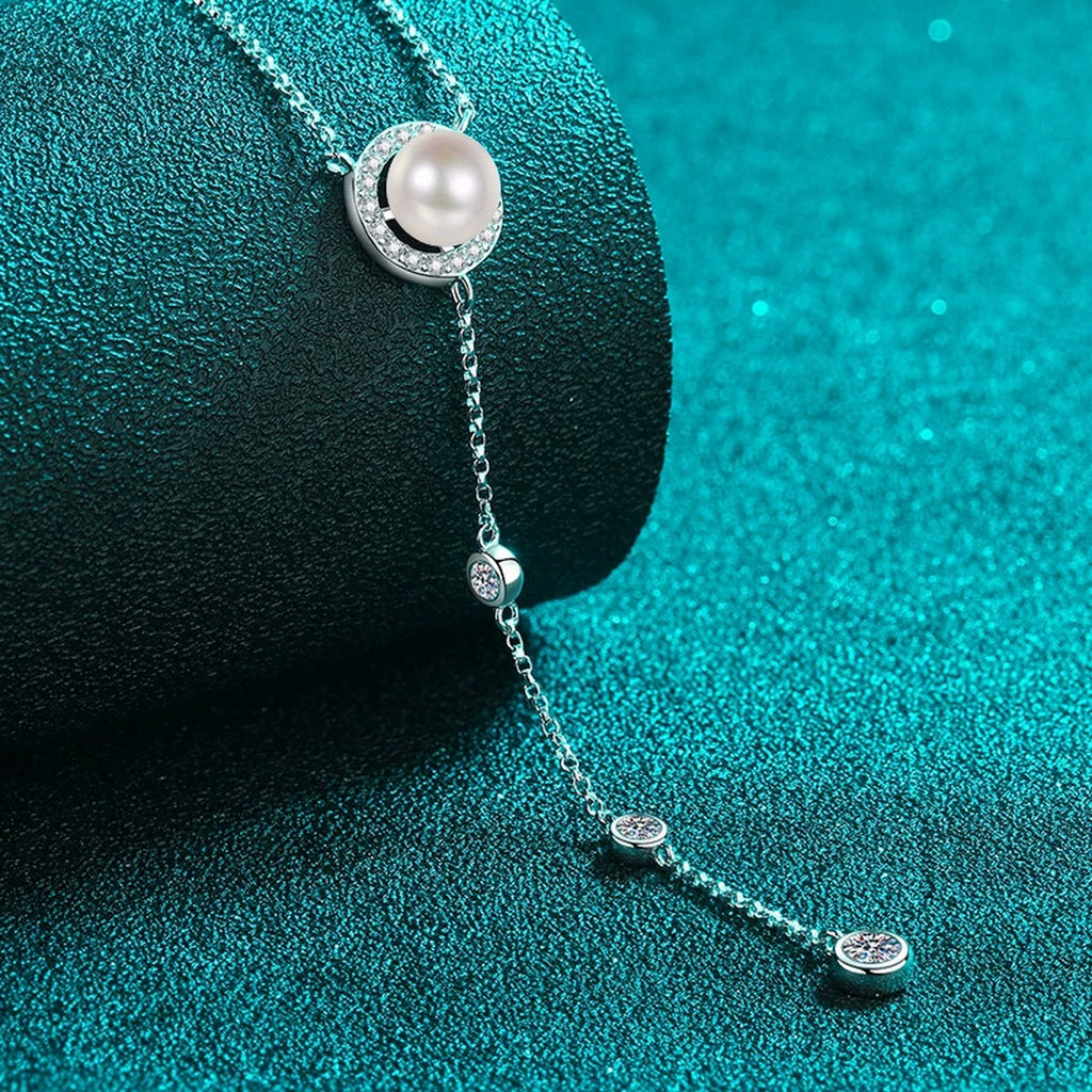 Lariat Moissanite Pearl Necklace in Rhodium-Plated S925 sterling silver blue display scene showing chain and stone layout