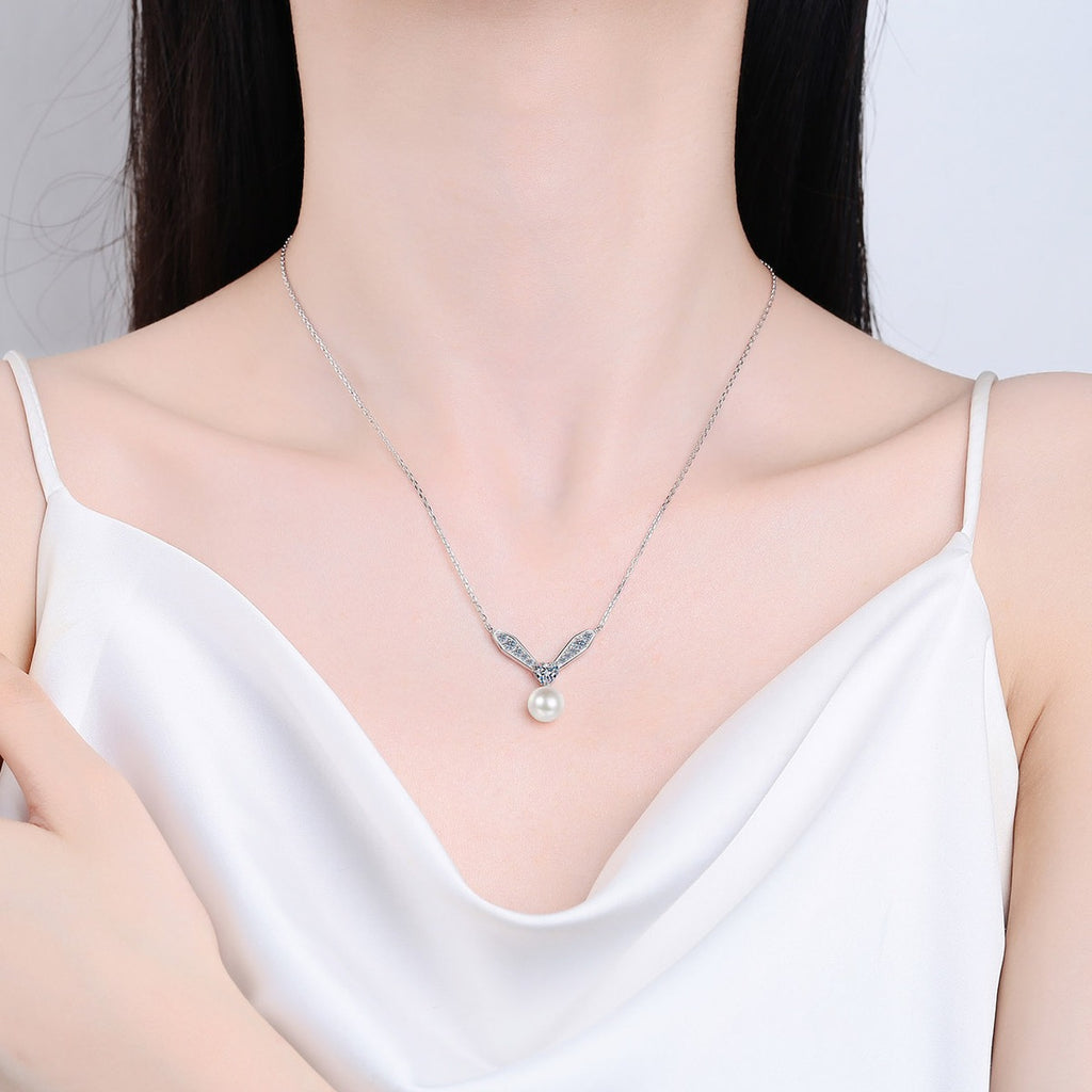 Heart and Leaf Moissanite Pearl Necklace in Rhodium-Plated S925 sterling silver neckline model view showing pendant scale and adjustable chain