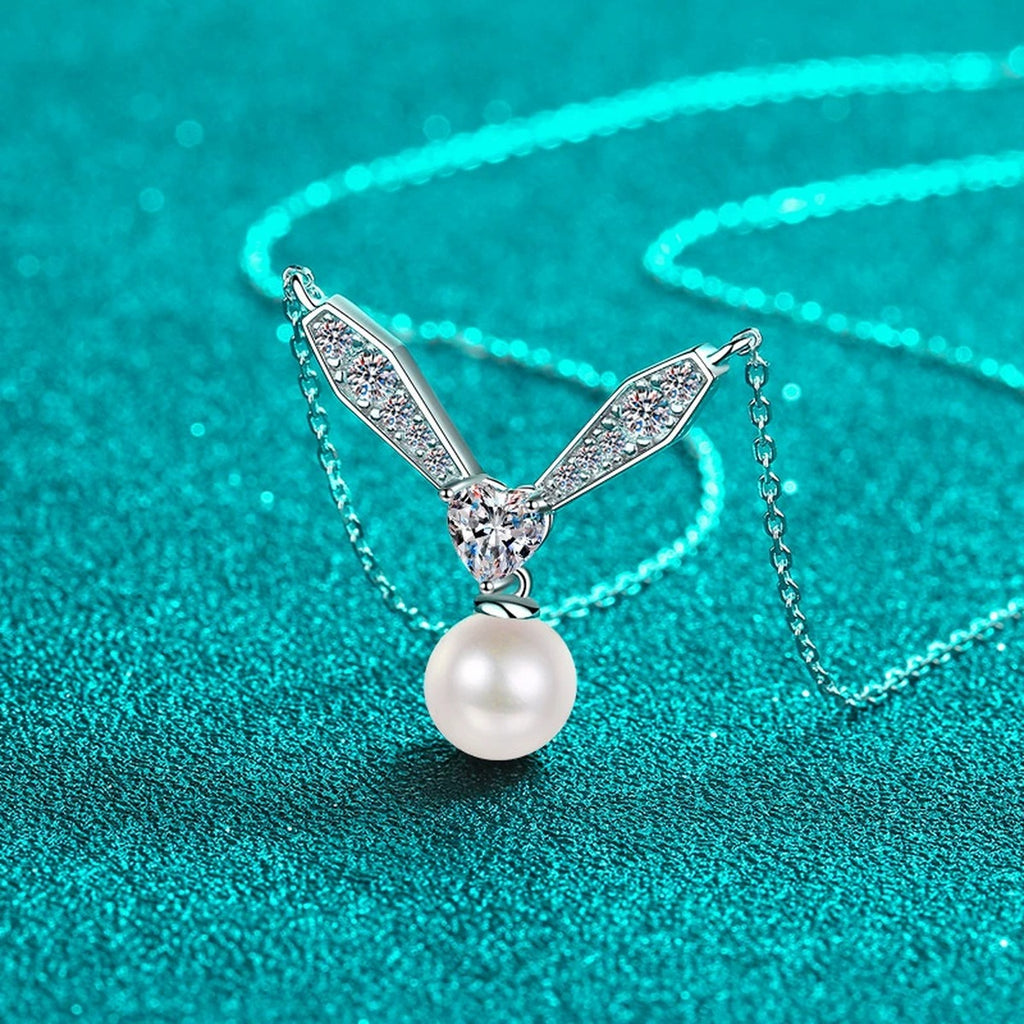 Heart and Leaf Moissanite Pearl Necklace in Rhodium-Plated S925 sterling silver blue display scene showing chain and stone layout