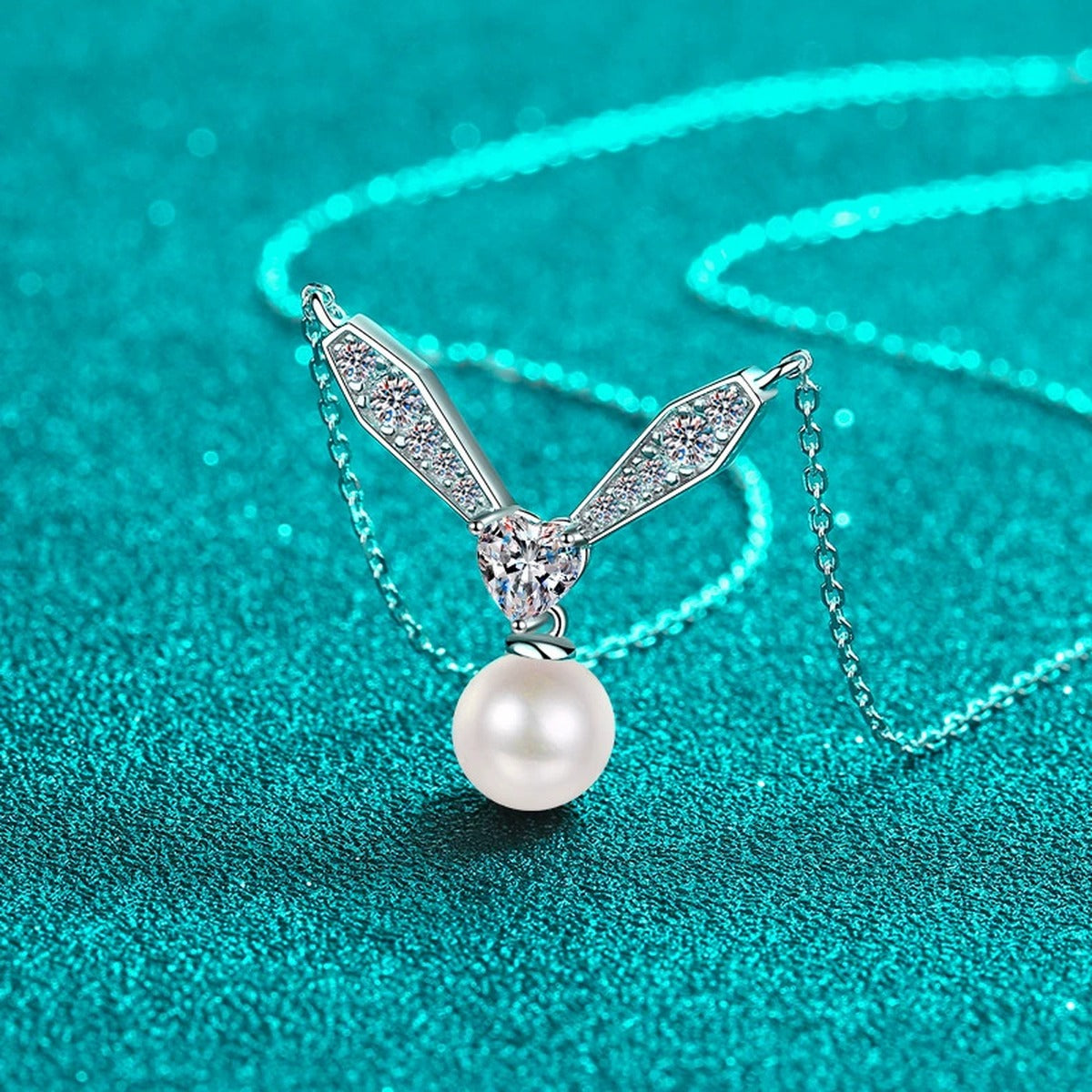 Heart and Leaf Moissanite Pearl Necklace in Rhodium-Plated S925 sterling silver blue display scene showing chain and stone layout