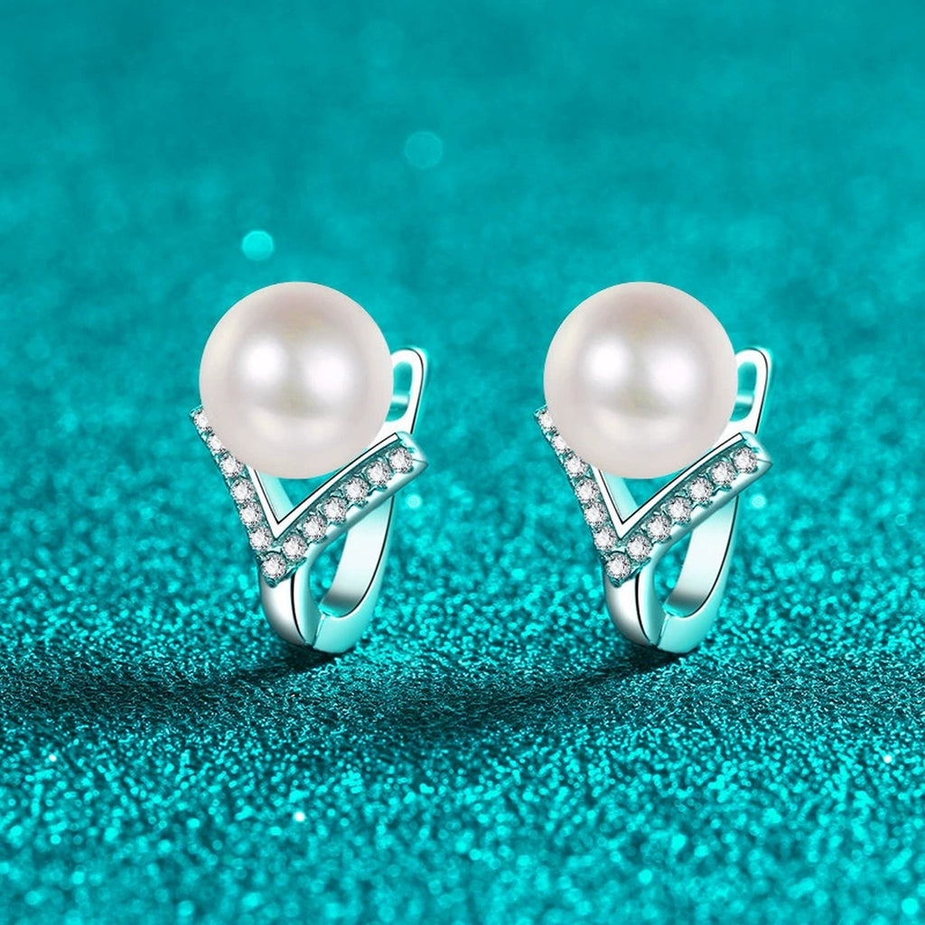 Pearl and Moissanite Huggie Hoop Earrings in Rhodium-Plated S925 sterling silver product scene view showing side profile