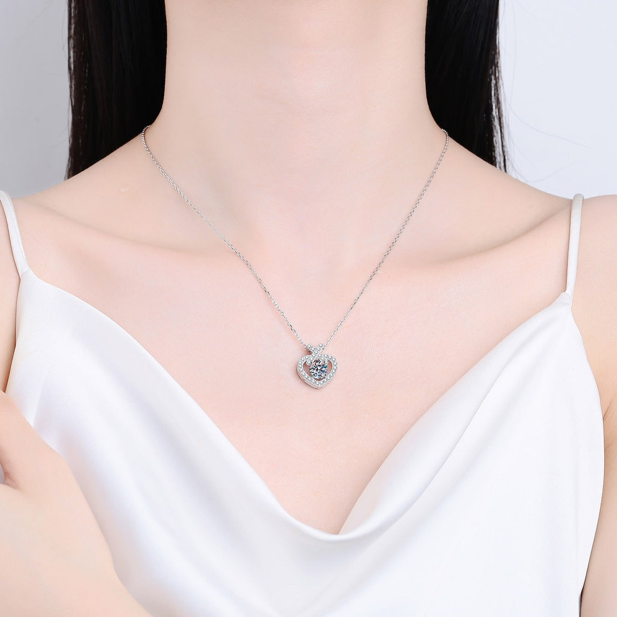 Heart Moissanite Pendant Necklace with CZ in Rhodium-Plated S925 sterling silver neckline model view showing pendant scale and adjustable chain