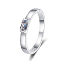 Emerald Cut Moissanite Band Ring in rhodium-plated S925 sterling silver on clean white background