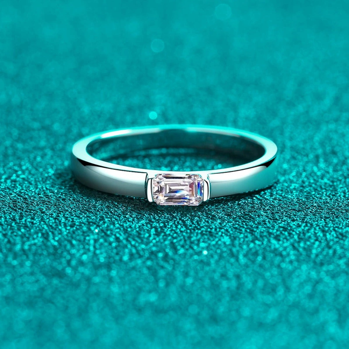 Emerald Cut Moissanite Band Ring product view showing moissanite setting and metal finish