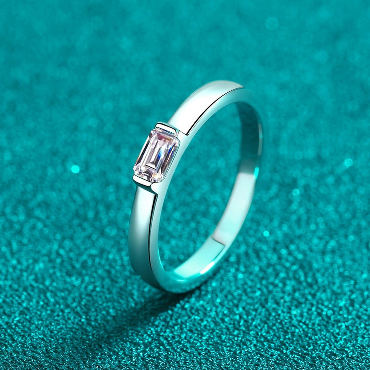 Emerald Cut Moissanite Band Ring product view showing moissanite setting and metal finish