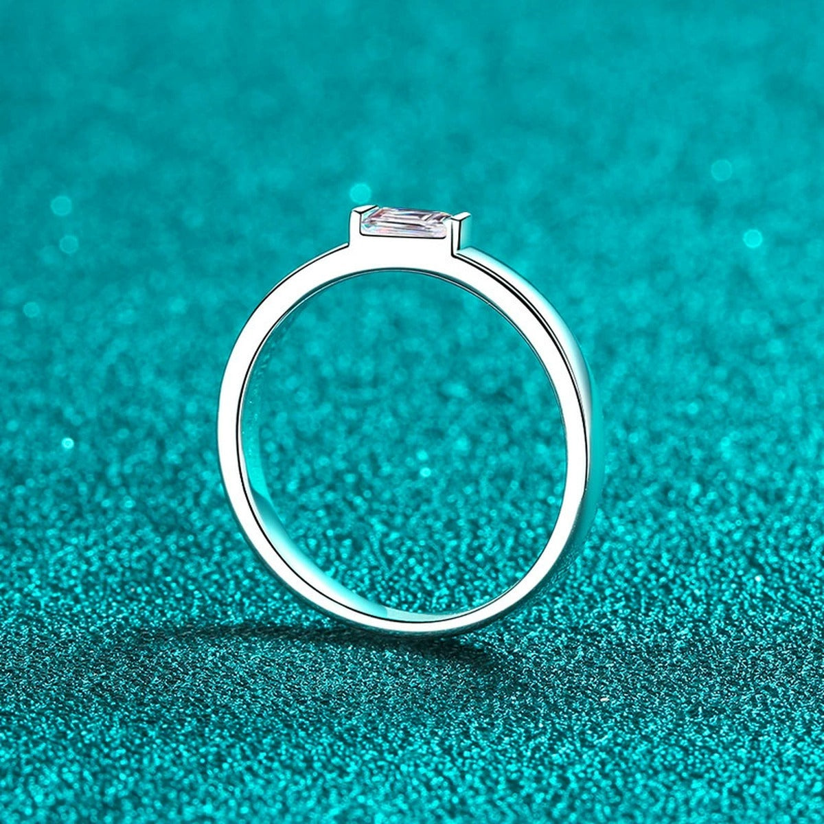 Emerald Cut Moissanite Band Ring product view showing moissanite setting and metal finish