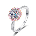 Round Moissanite Ring with Pink CZ in rhodium-plated S925 sterling silver on clean white background