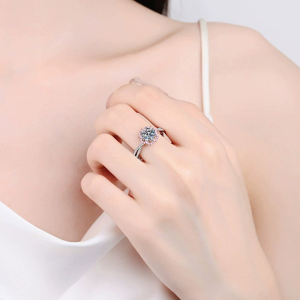 Round Moissanite Ring with Pink CZ worn on hand to show scale, band width, and ring profile