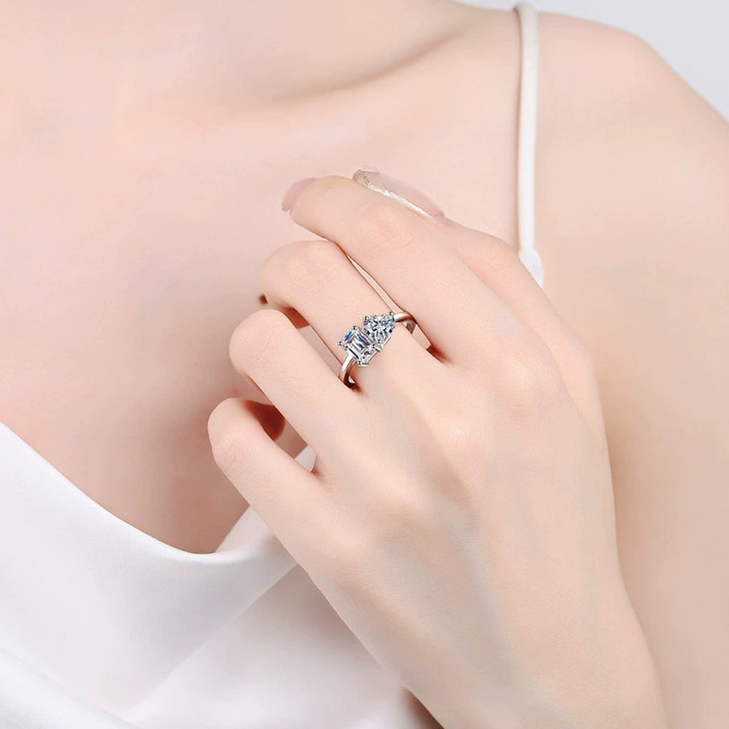 Heart and Rectangular Cut Moissanite Ring worn on hand to show scale, band width, and ring profile