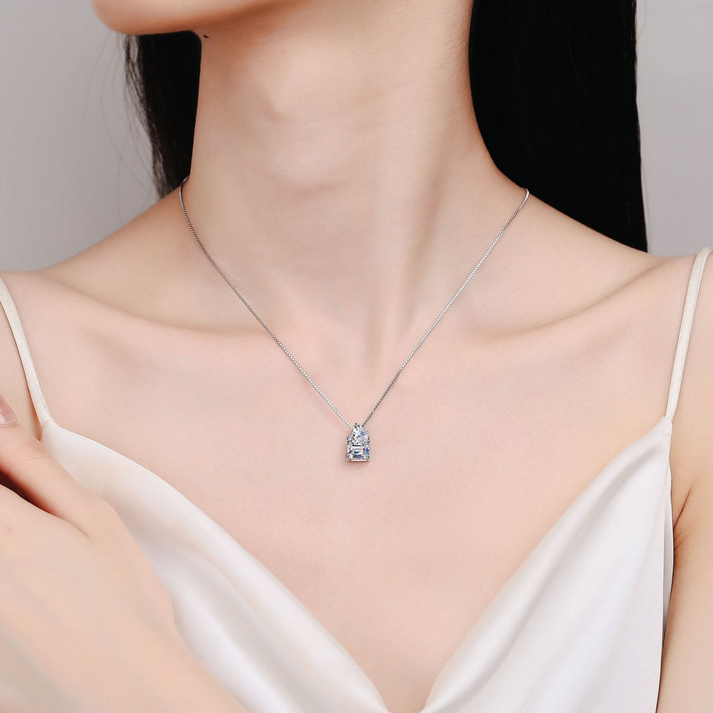 Heart Emerald and Radiant Cut Moissanite Pendant Necklace in Rhodium-Plated S925 sterling silver neckline model view showing pendant scale and adjustable chain