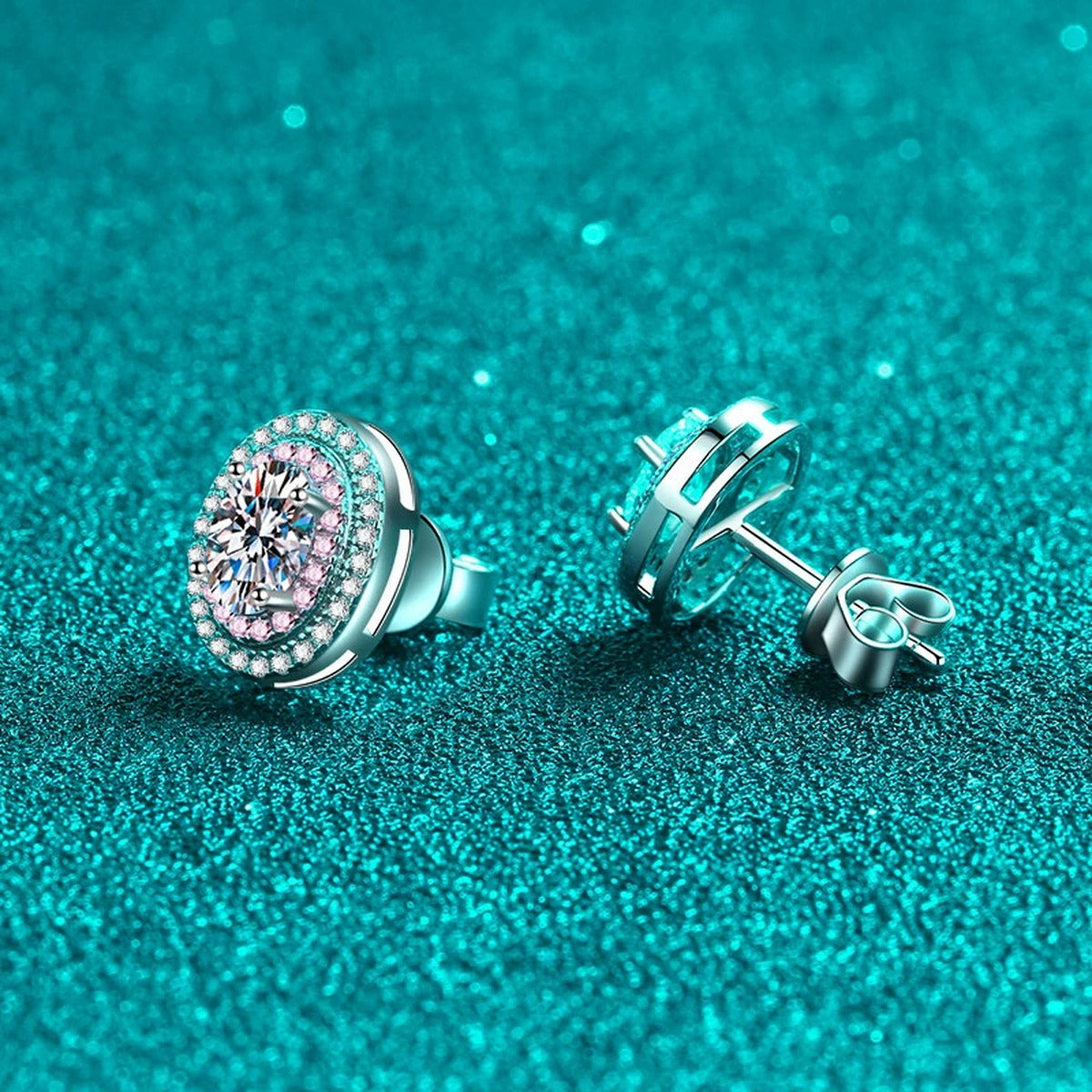 Oval Moissanite Stud Earrings with Pink CZ in Rhodium-Plated S925 sterling silver product scene view showing angled setting detail