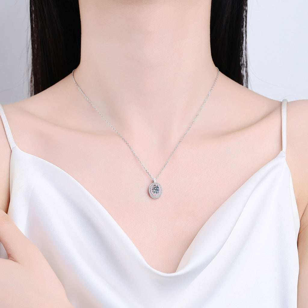Pink CZ Oval Moissanite Halo Pendant Necklace in Rhodium-Plated S925 sterling silver neckline model view showing pendant scale and adjustable chain
