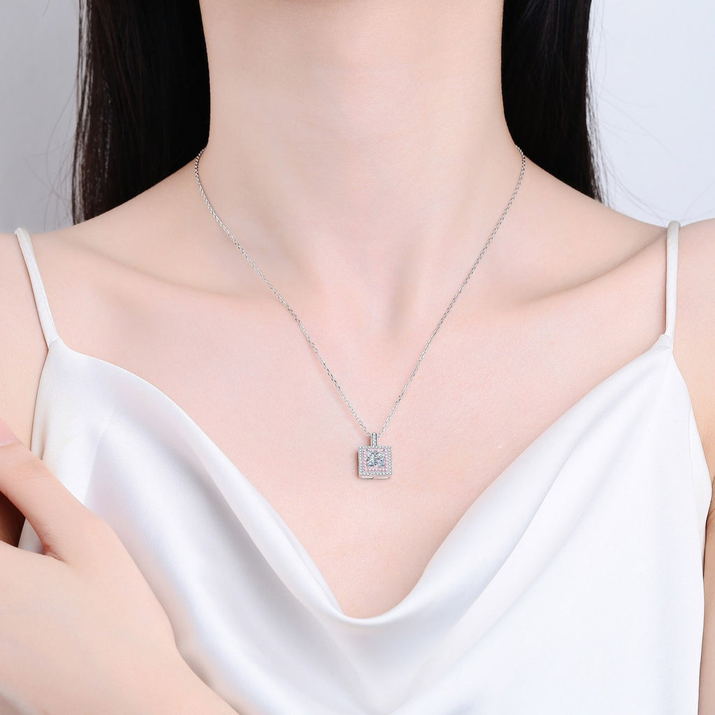 Pink CZ Princess Cut Moissanite Halo Pendant Necklace in Rhodium-Plated S925 sterling silver neckline model view showing pendant scale and adjustable chain