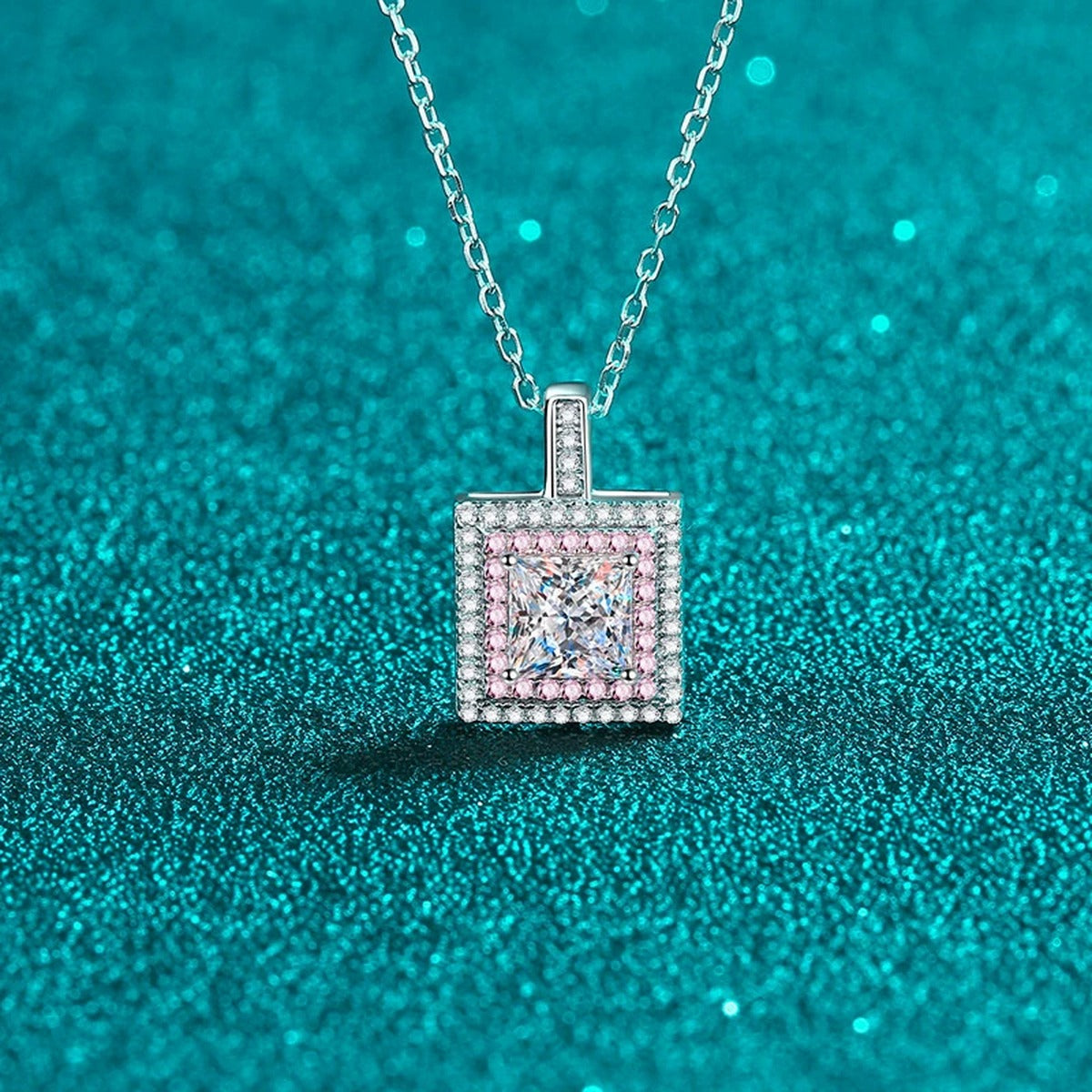Pink CZ Princess Cut Moissanite Halo Pendant Necklace in Rhodium-Plated S925 sterling silver blue display scene showing chain and stone layout