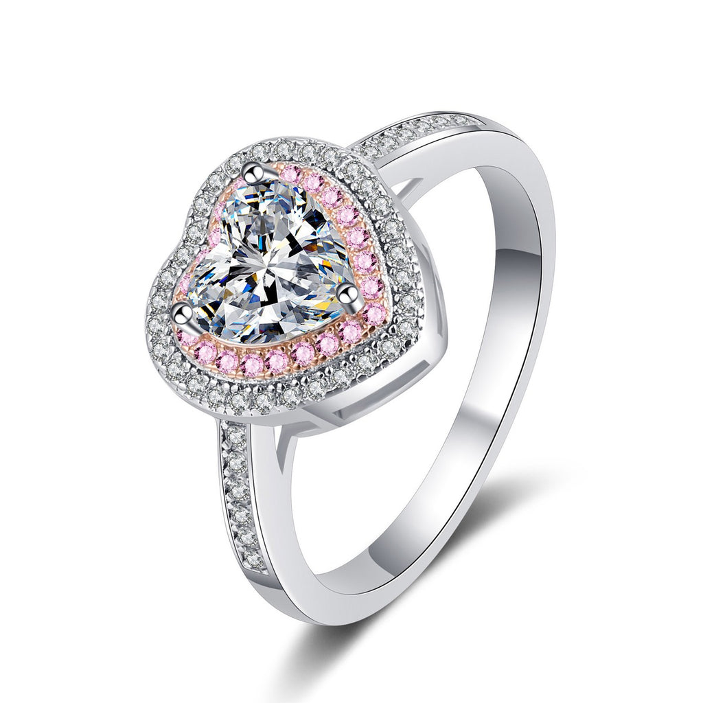 Heart Cut Moissanite Ring with Pink CZ in Rhodium-Plated S925 Sterling Silver clean white background product photo showing the ring silhouette and moissanite setting