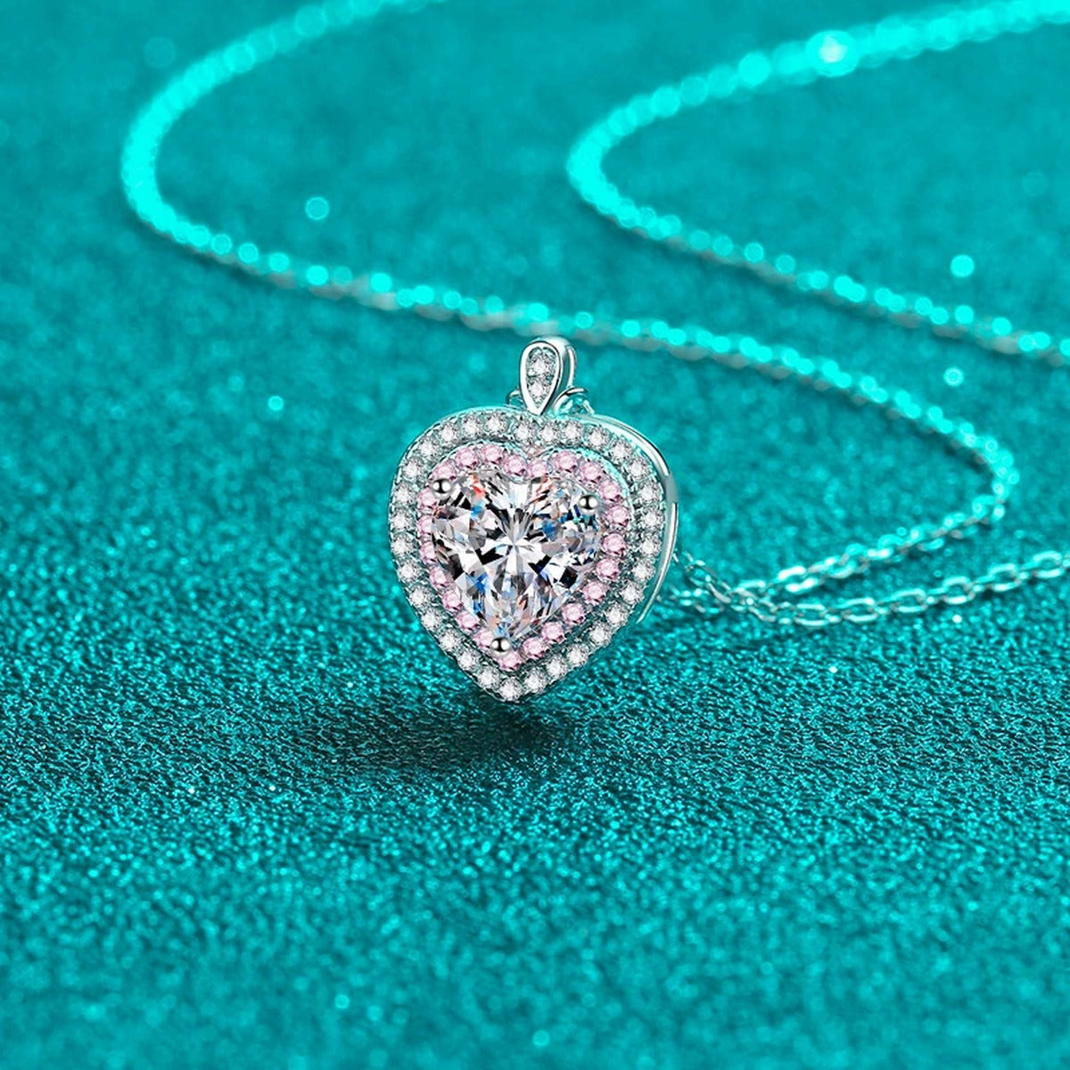 Pink Heart Moissanite Necklace with CZ in Rhodium-Plated S925 sterling silver blue display scene showing chain and stone layout