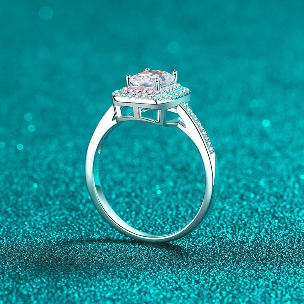 Emerald and Radiant Cut Moissanite Ring with Pink CZ in Rhodium-Plated S925 Sterling Silver blue display product photo showing the moissanite setting, stone cut, and band profile
