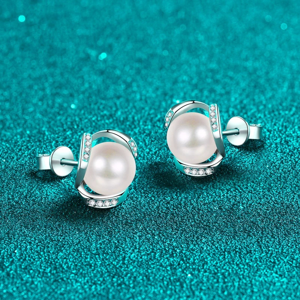 Twist Pearl and Moissanite Stud Earrings in Rhodium-Plated S925 sterling silver product scene view showing angled setting detail