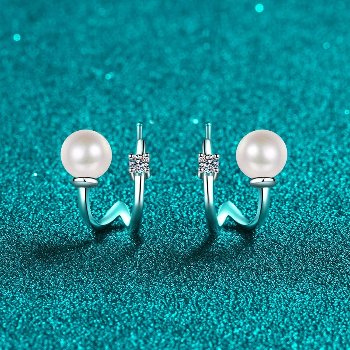 Pearl and Moissanite Stud Ear Cuff Earrings in Rhodium-Plated S925 sterling silver product scene view showing angled setting detail