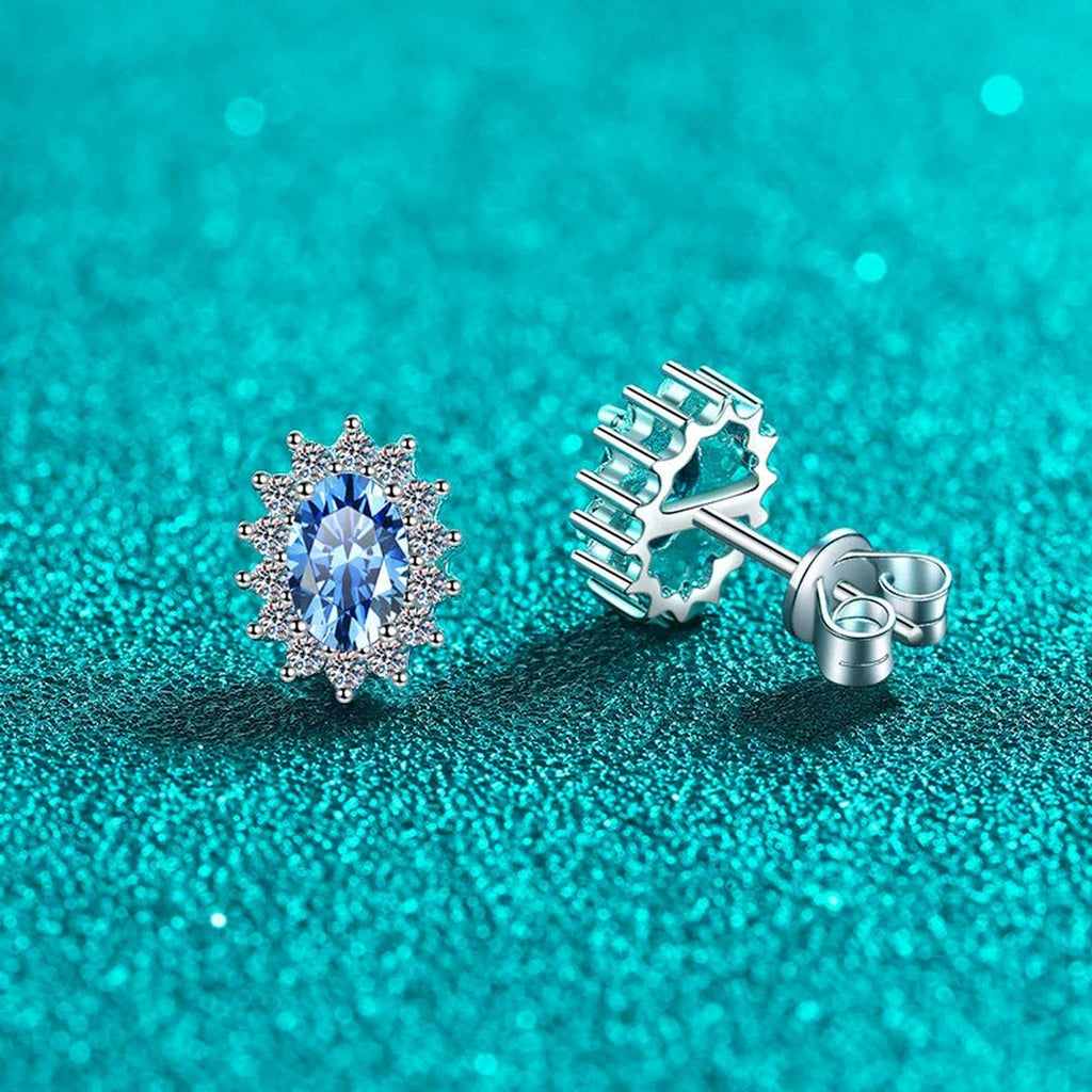 Blue Oval Moissanite Halo Stud Earrings with CZ in Rhodium-Plated S925 sterling silver product scene view showing front sparkle