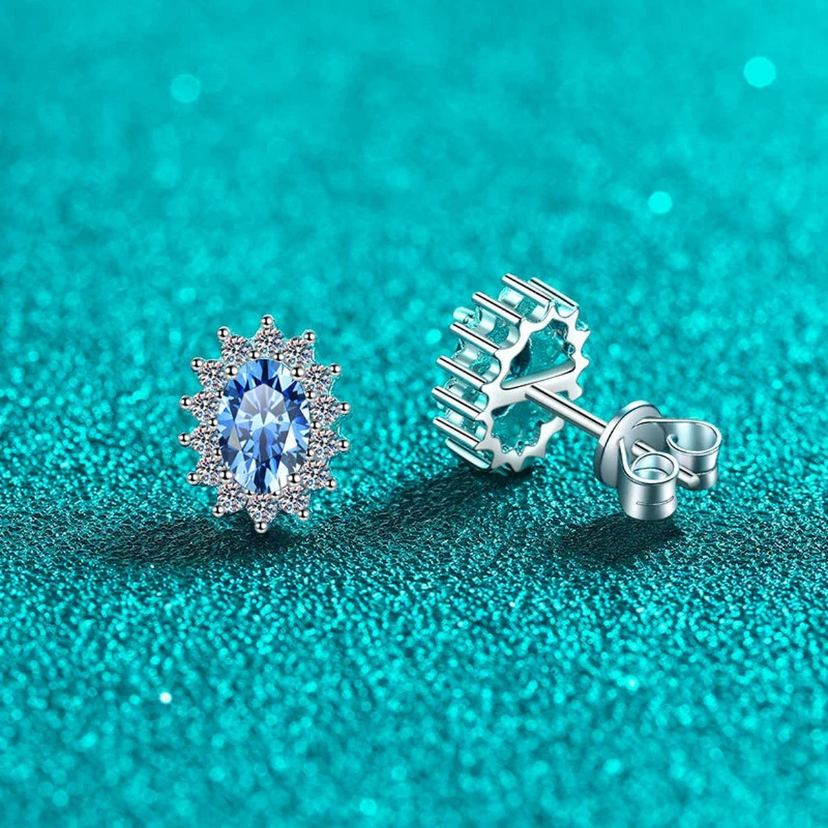 Blue Oval Moissanite Halo Stud Earrings with CZ in Rhodium-Plated S925 sterling silver product scene view showing front sparkle