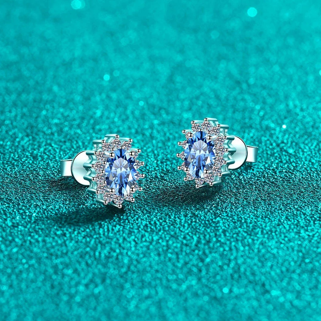 Blue Oval Moissanite Halo Stud Earrings with CZ in Rhodium-Plated S925 sterling silver product scene view showing angled setting detail