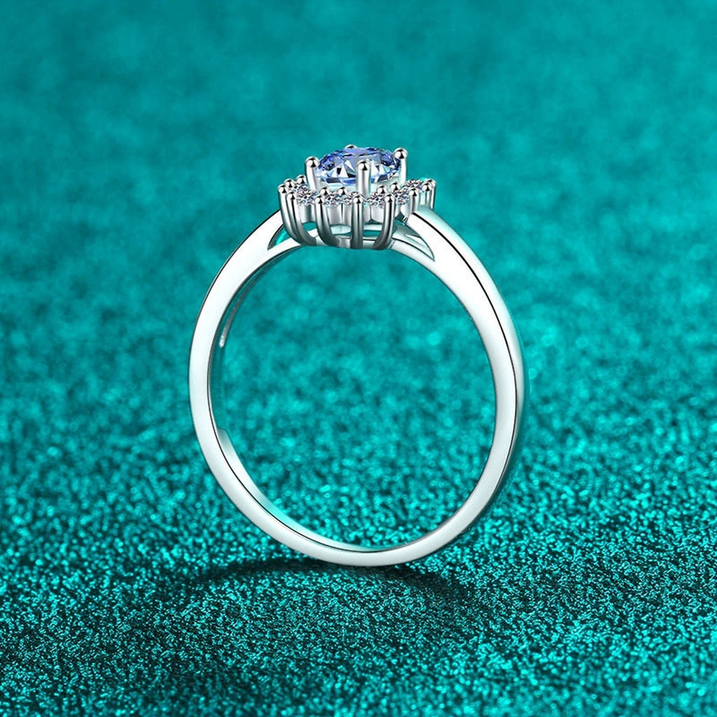 Blue Oval Moissanite Ring with CZ in Rhodium-Plated S925 Sterling Silver blue display product photo showing the moissanite setting, stone cut, and band profile