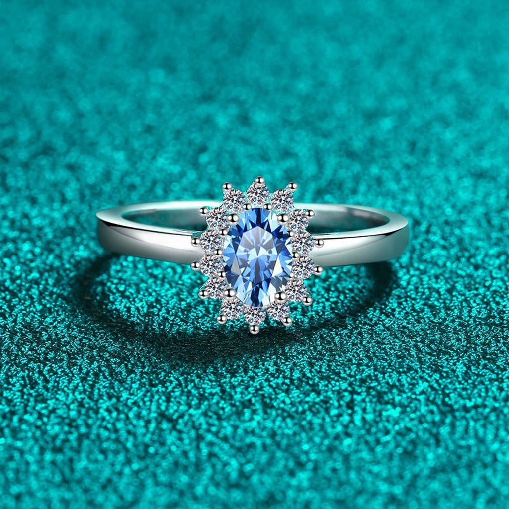 Blue Oval Moissanite Ring with CZ in Rhodium-Plated S925 Sterling Silver blue display product photo showing the moissanite setting, stone cut, and band profile