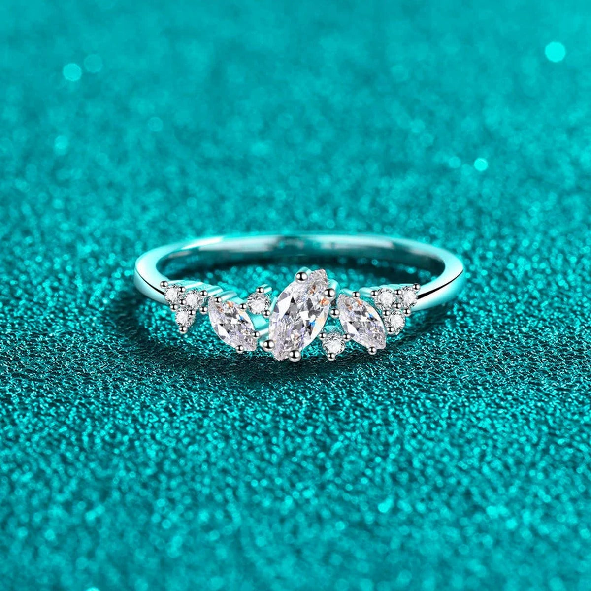 Marquise and Round Moissanite Stackable Ring product view showing moissanite setting and metal finish