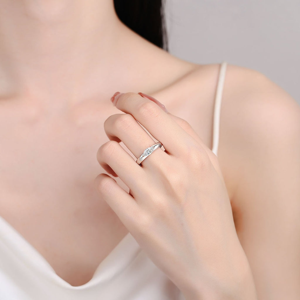 Marquise Cut Moissanite Ring worn on hand to show scale, band width, and ring profile