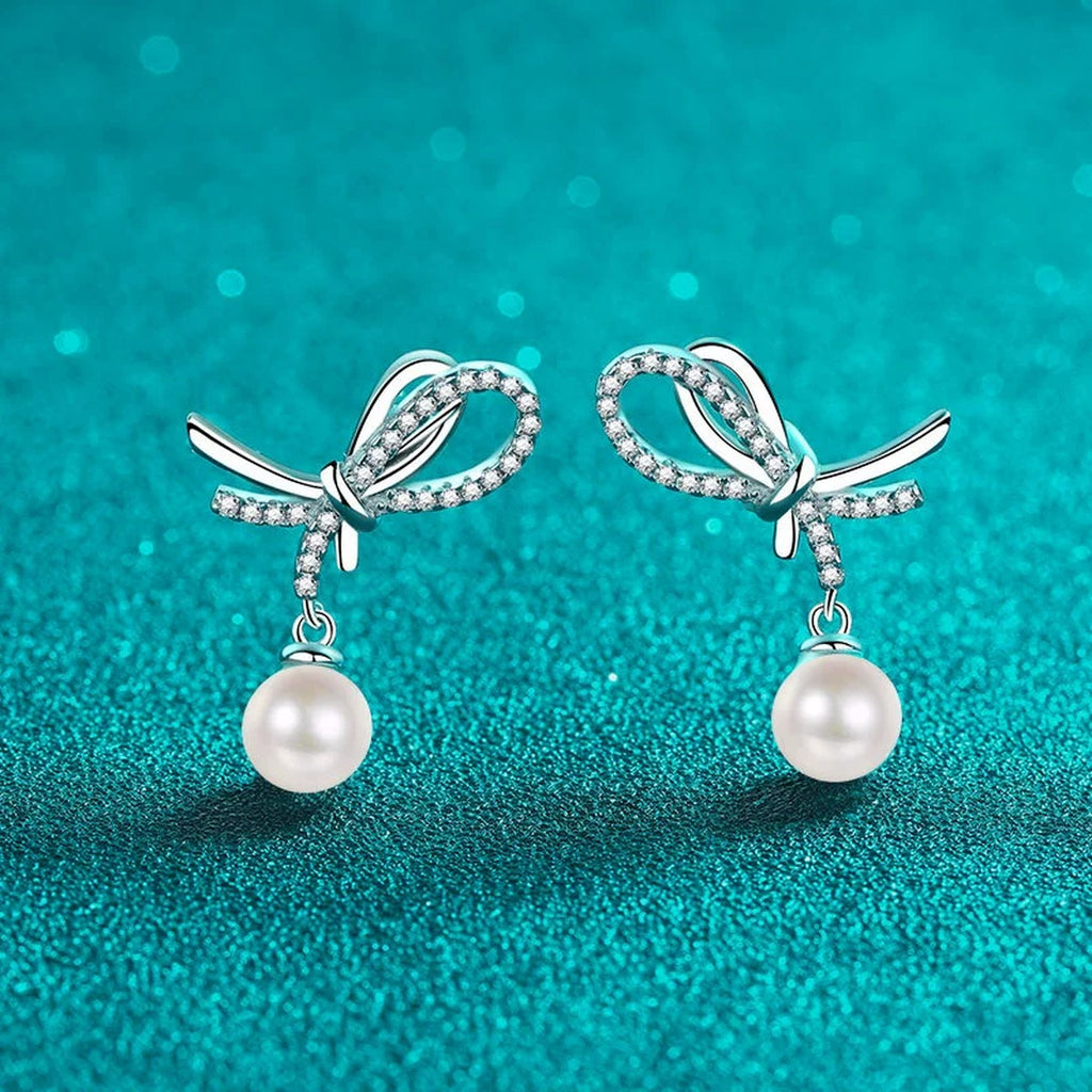 Bow Pearl Moissanite Stud Dangle Earrings in Rhodium-Plated S925 sterling silver product scene view showing front detail