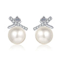 Bow Pearl and Moissanite Stud Dangle Earrings with CZ in Rhodium-Plated S925 sterling silver white background product photo showing the pair, stone shape, and stud dangle earrings silhouette