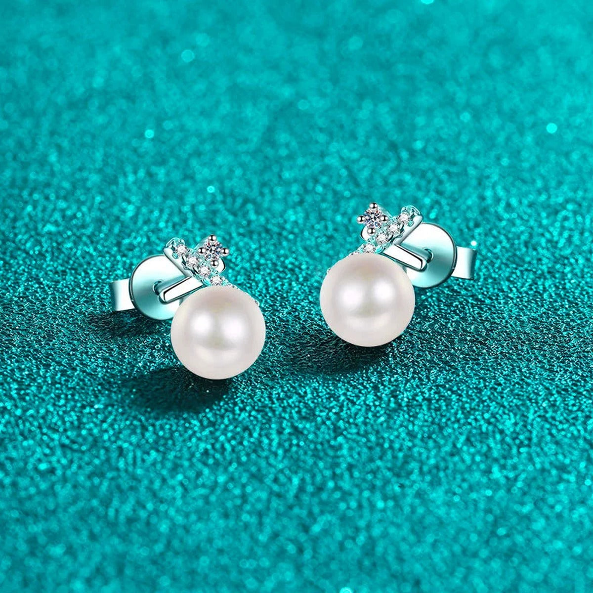 Bow Pearl and Moissanite Stud Dangle Earrings with CZ in Rhodium-Plated S925 sterling silver product scene view showing angled setting detail