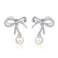 Bow Pearl and Moissanite Stud Dangle Earrings in Rhodium-Plated S925 sterling silver white background product photo showing the pair, stone shape, and stud dangle earrings silhouette