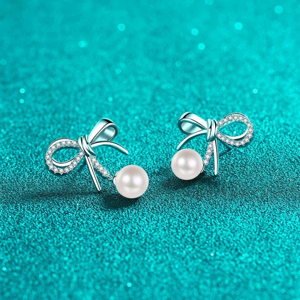 Bow Pearl and Moissanite Stud Dangle Earrings in Rhodium-Plated S925 sterling silver product scene view showing angled setting detail