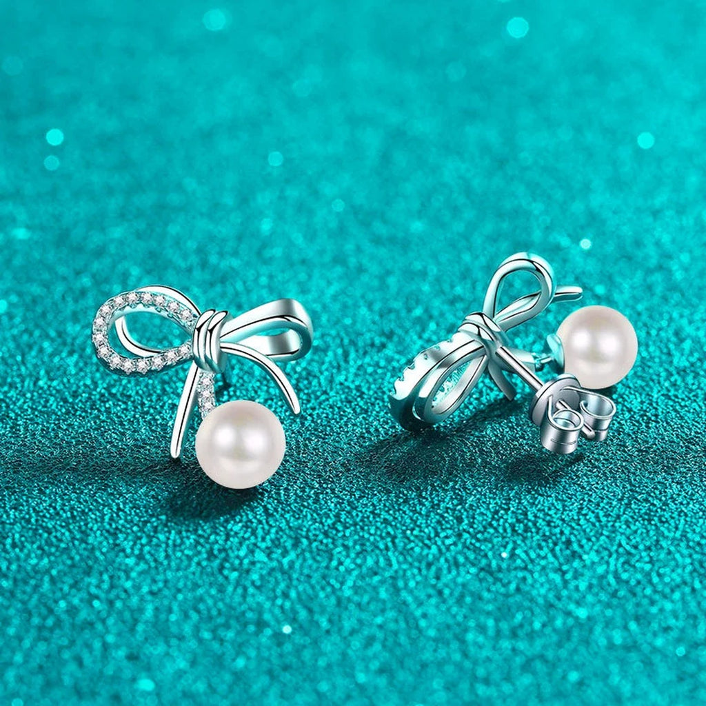 Bow Pearl and Moissanite Stud Dangle Earrings in Rhodium-Plated S925 sterling silver product scene view showing side profile