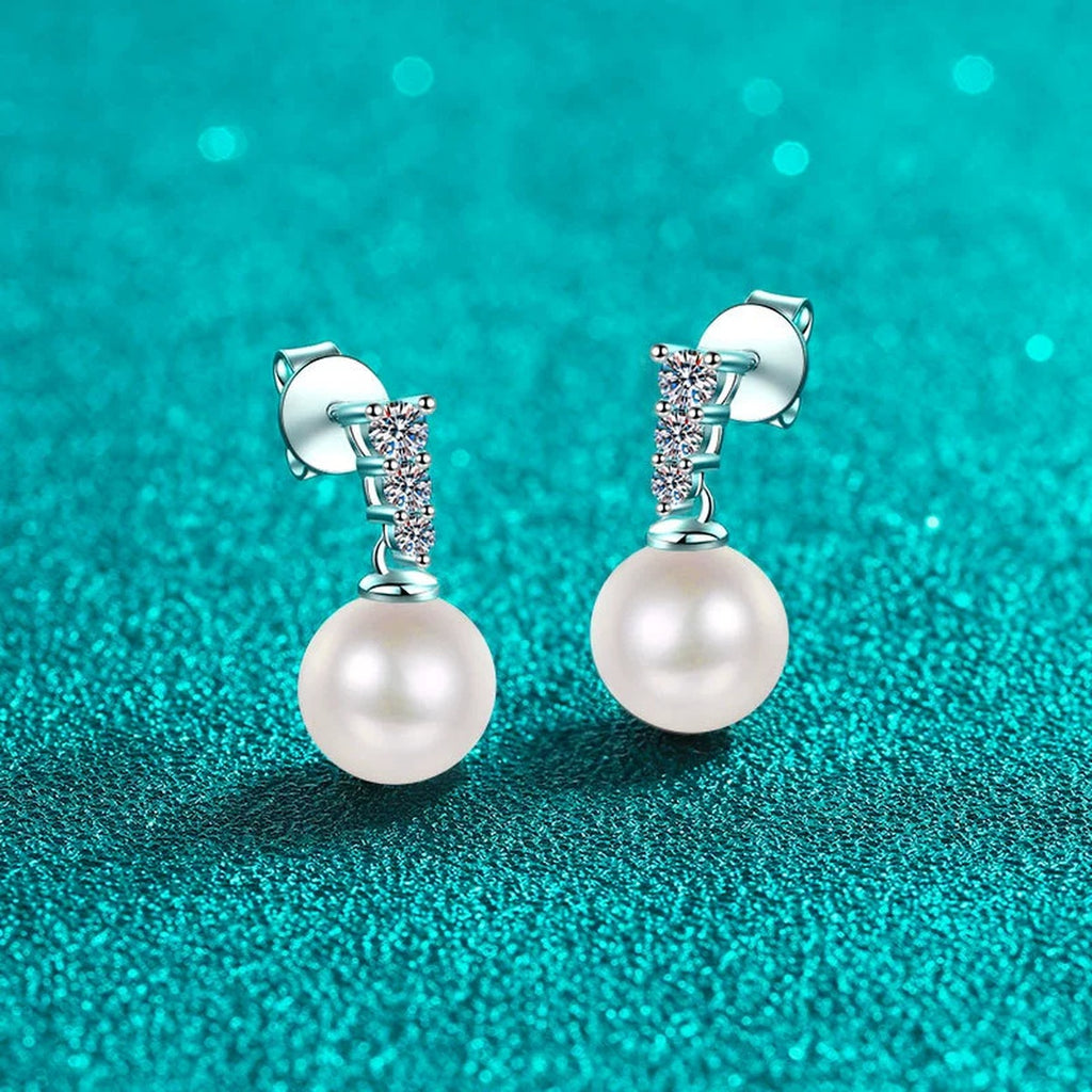 Pearl and Moissanite Stud Dangle Earrings in Rhodium-Plated S925 sterling silver product scene view showing front sparkle