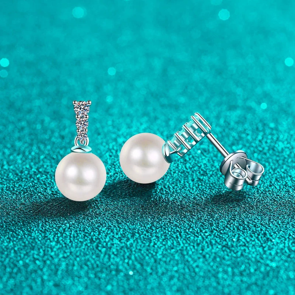 Pearl and Moissanite Stud Dangle Earrings in Rhodium-Plated S925 sterling silver product scene view showing angled setting detail