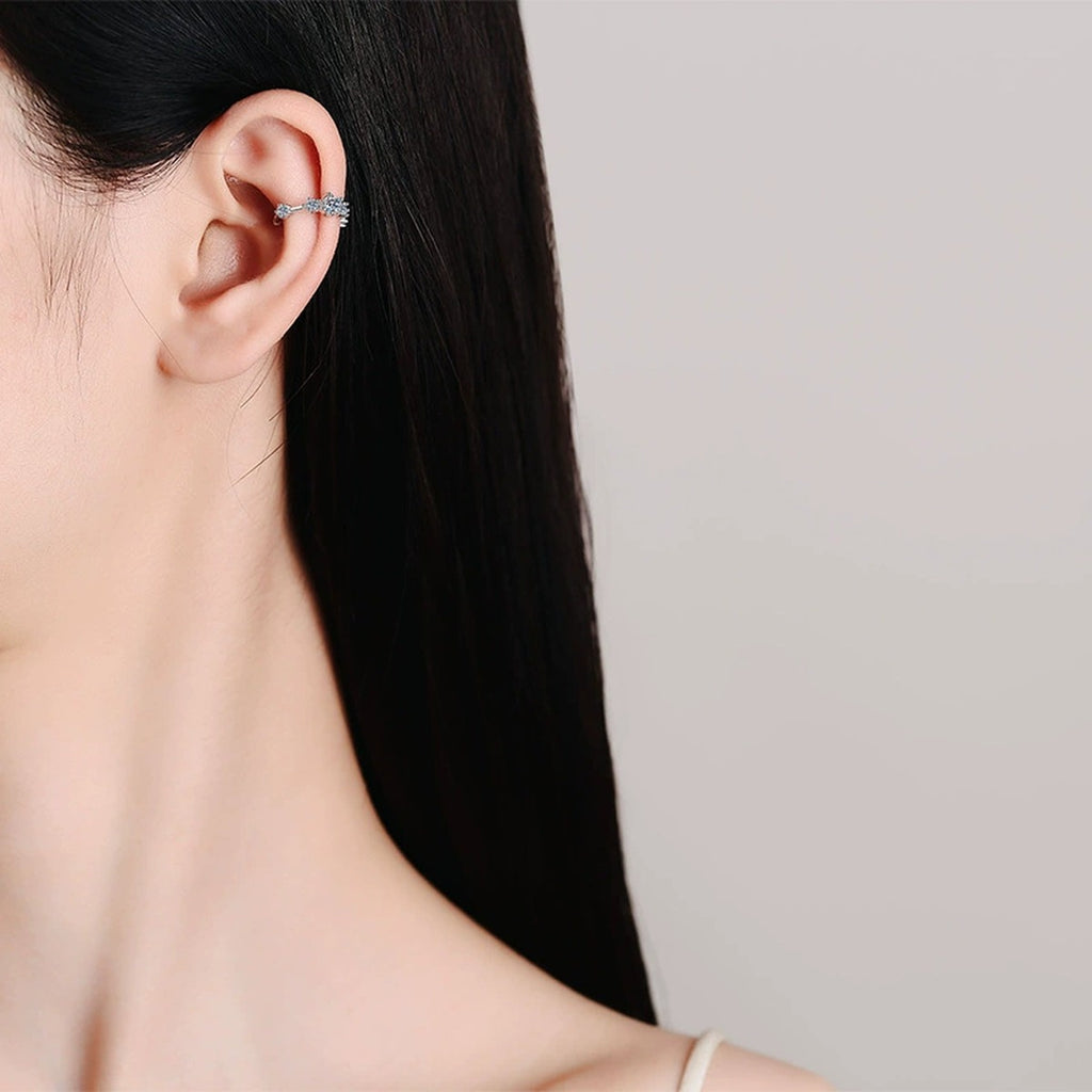 Pave Moissanite Ear Cuff Earrings in Rhodium-Plated S925 sterling silver worn on ear by model showing scale, placement, and ear cuff earrings styling